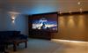 Photo 19 Media and Cinema room with retractable projection screen and automatic blackout screens